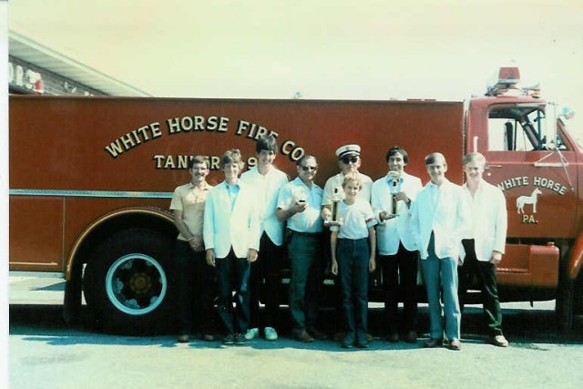Chief Parmer (center) with the crew from Tanker 4-9 with trophies from Honey Brook's 1986 Parade.